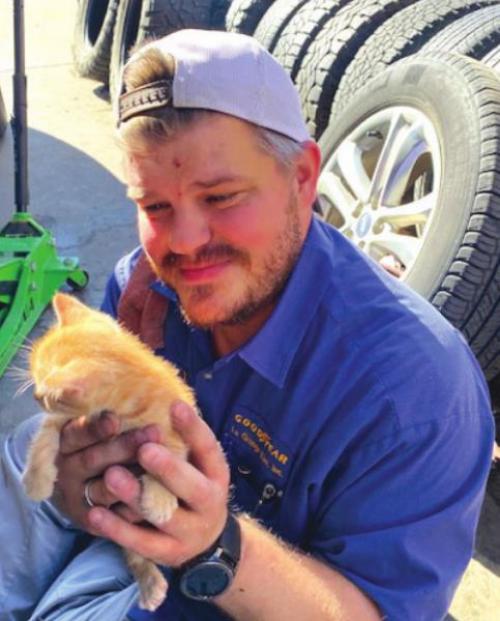 Ryan Vasek with one of the rescued kittens.