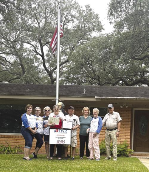 Pictured from left: Susan Glover, Donna Pustejovsky, Connie Dittrich, Robert and Sandy Chaloupka, Stephanie Mattix, Judy and David Zachmeyer. Making an appearance in the back was George Washington. Picture by Chanea Grisham.