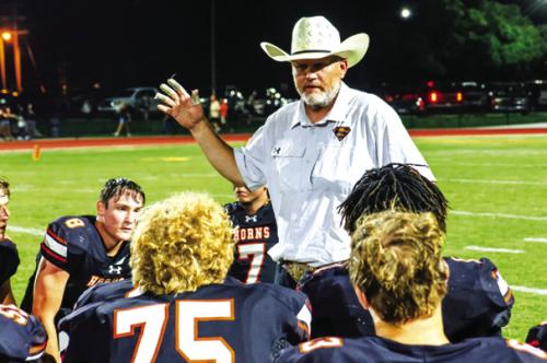 Hats Off to the New Coach