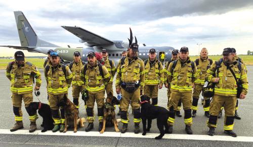 A team of 16 firefighters and search K-9s from the Czech Republic’s elite Urban Search and Rescue team arrived in Texas last week to help search for people missing from the July 4 Hill Country floods. Photo by Czech Fire Rescue Service