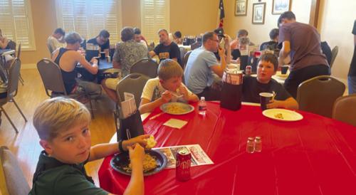 Band members, their sponsors and staff enjoy dinner at TCHCC.