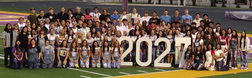 The members of the senior class of 2027 at La Grange High School gathered on the field for the Senior Sunrise event before the first day of school Wednesday. Photo by Lucy Carr