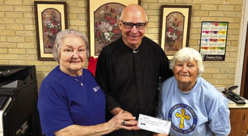 Members of Annunciation KJZT #41 of Ellinger donated a check for $675 to Father Steve Sauser from their annual fundraiser. President Gladys Polasek and Secretary Mary Vrazel did the presentation. Gladys is on the left in the picture, and Mary is on the right. The date of the donation was Tuesday September 22.
