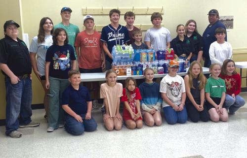 On Sunday, Nov. 17, the Pure Country 4-H Club donated water, Gatorade and electrolyte drinks to the Ellinger Volunteer Fire Department for their November service project. On hand to accept the donation representing the fire department was Brandon Karisch.