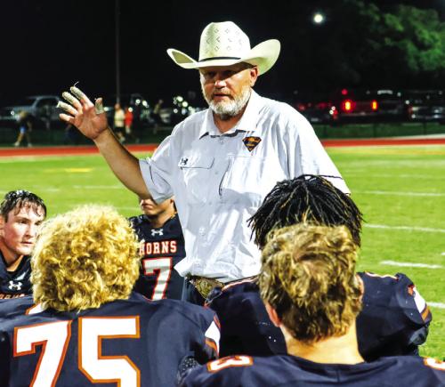 Schulenburg football coach Clay Ferguson talks to his players after a game last season, Ferguson’s first during which the Shorthorns went 6-6. Friday the school announced that Ferguson was being relieved of his head coaching and athletic director duties. Photo by Andy Behlen