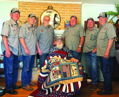 Presenting the quilt to Bob Baker were VVA 870 Members Eugene Krupala, Don Christen, Ron Dorsey, Daniel Kutac, Frank White and Andy Janda.