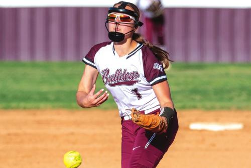 Flationia’s Ali Janecka strikes out a Bloomington batter in Tuesday’s district game. Janecka threw a no-hitter. Photo by Stephanie Steinhauser