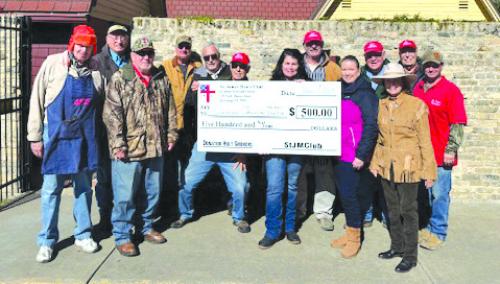 St. James’ Holy Smokers presented a check to the Gardenia E. Janssen Animal Shelter’s Executive Director, Teresa Brown, Volunteer Coordinator, Lisa Slinkard, and Board Secretary, Ann Rauch.