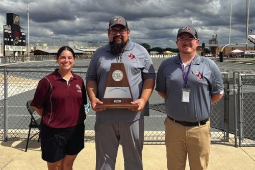 Pictured are the Flatonia Band Staff: (from left) Color Guard Instructor Amanda Bass, Director of Bands Justin Bartlett, and Assistant Band Director Kyle Lane.