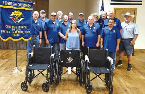 Knights of Columbus Chromcik Council No. 2574 purchased wheelchairs for Care Inn, Monument Hill and Jefferson Place. Julia Petzold was present to accept the donation for Jefferson Place.