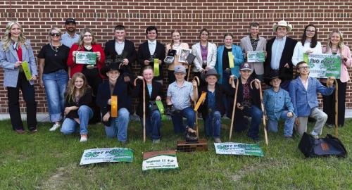Pictured front from left: Hayleigh Pizzitola, Crockett Guenther, Abigale McBride, Jehnsen Janecka, Joe Carrales, Hudson Holub, Rowdy Guenther and Tate Fritsch; back row: Hailey Janish, Coaches Kaci and JoJo Carrales, Rheagan Karisch, Abraham McBride, Logan Poncik, Kaisley Janecka, Adalyn Carrales, Brealey Nieto, Holden Holub, Rilan Karisch, Tatum Fritsch and Keeley Warnken.