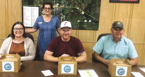 Senior Connections delivered the goods from the baking team last month to several Flatonia offi cials. Senior Connections is excited to expand into Flatonia this month and thought these folks needed a gift. Pictured from left: Jaqueline Ott, Flatonia City Secretary (Stephanie Shroyer, Senior Connections Program Director), Flatonia Mayor Travis Seale, (who is the first Lunch and Learn speaker in Flatonia) and Fayette County Commissioner Harvey Berckenhoff.