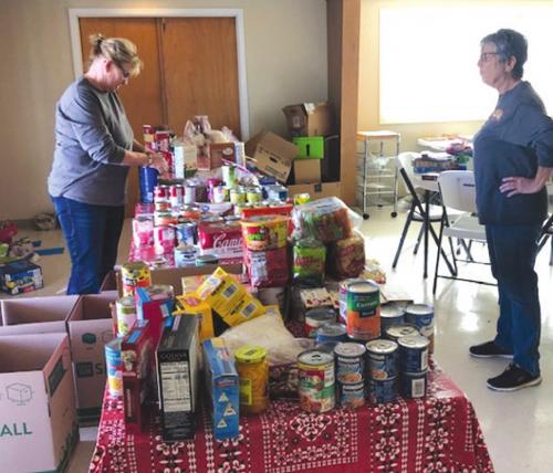 St. Nicholas Colorado County volunteers hard at work: Sandy Pesak (left) and Michelle Herzik (right).