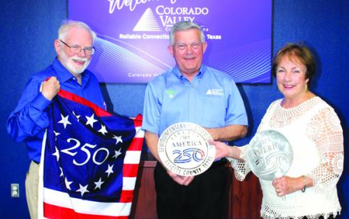 To celebrate America’s 250th birthday, 250 “Liberty Trees” will be planted this fall all across the county. Colorado Valley Communications is the first Gold Sponsor for the project. Larry Jackson, project chair, and Karen Mahoney-Woods, project secretary, present CVCTX president and general manager Kelly Allison with a Liberty Tree commemorative medallion.