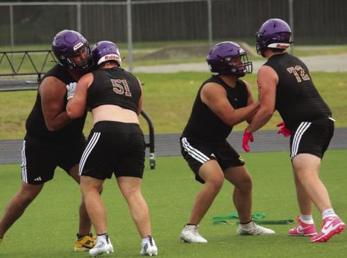 La Grange linemen go through drills Tuesday morning at Leopard Stadium. Photos by Jeff Wick