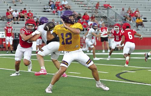 La Grange senior quarterback Eli Gillum readies to make a pass in Friday’s scrimmage. Photo by Darrell D. Gest
