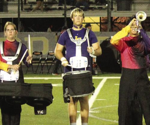 Travis Hill the Leps varsity football player, left, and Travis Hill, right, as he looks after taking off the jersey and shoulder pads and grabbing his snare drum with the Leopard Marching Band every Friday night. Photos by Jeff Wick