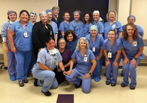 St. Mark’s Medical Center Surgical team, left to right: back row: Megan Koranek, RN; Annie Murphy, CST; Doris Klesel, RN; Stacie Schramek, RN; Jenifer Leyendecker, RN; Maggie Venegas, CST; Lensey Spradley, RN; Chelsea Seggern, ST; Kathy Janak, RN; Brenda McKenzie, housekeeper; Middle row: Taylor Dominguez, RN; Jennifer Farris, CRNA; Bobbie Krause, scheduler; Lynn Neely, RN; Carleigh Hightower, RN; Karalie Ross, sterile processing tech; Donna Rebecek, RN; front row: Jennifer Schulze, RN; Karen Kilian, RN.