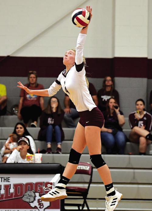 Flatonia’s Emma Klozik goes up for a hit in Tuesday night’s district match up against Shiner. Photo by Stephanie Steinhauser