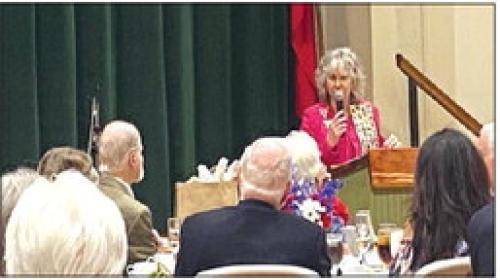 Guest speaker, Georgi Anne Uribe Brochstein, discusses the work of the E Pluribus Unum Committee of NSDAR.