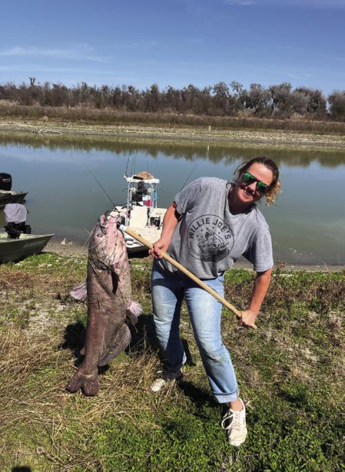 My wife Janessa holds up the massive blue catfish she and her brother caught last weekend. It might have been the record blue cat for the Nueces River. But my wife and her brother, in typical fashion, filleted that sucker without a thought of weighing or measuring it.