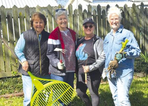The Faison House took two days to get spring ready. Pictured from left: Dana Sternadel, Cindy Hahn, Sherri Ahart, and Mary Battle. Not pictured: Jeanette Huelsebush.