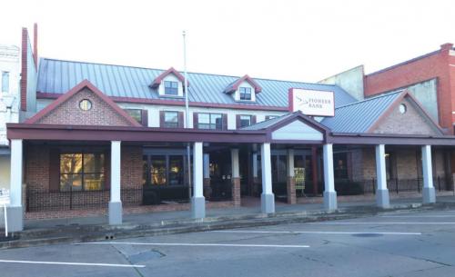 County Has Bank Building Under Contract for Expansion Plans
