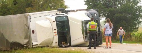 While Checking Cell Phone, Driver Flips Rig