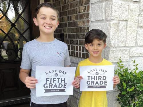 Kathy Chlumsky’s grandsons Conner and Hunter Dong on their last day of school when she went to see them.
