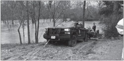 Man, 75, Rescued from Floodwaters