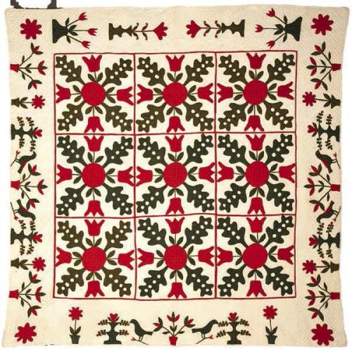 Oak Leaf and Tulip quilt, circa. 1850, maker unknown, part of the new exhibit, which opened last week at The Texas Quilt Museum.