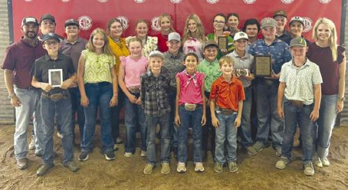 Front row: Joe Carrales, Emma Zwescpher, Rowdy Guenther, and Jehnsen Janecka; middle row: Tate Fritsch, Hayleigh Pizzitola, Abigale McBride, Hudson Holub, Parker Gabler, Crockett Guenther, Abraham McBride, and Coach Kaci Carrales; back row: Coach JoJo Carrales, Rilan Karisch, Hunter Gabler, Rheagan Karisch, Julia Melton, Hailey Janish, Sawyer Mau, Tatum Fritsch, Laramie Laake, Logan Poncik, Holden Holub, and Dylan Zwescpher.