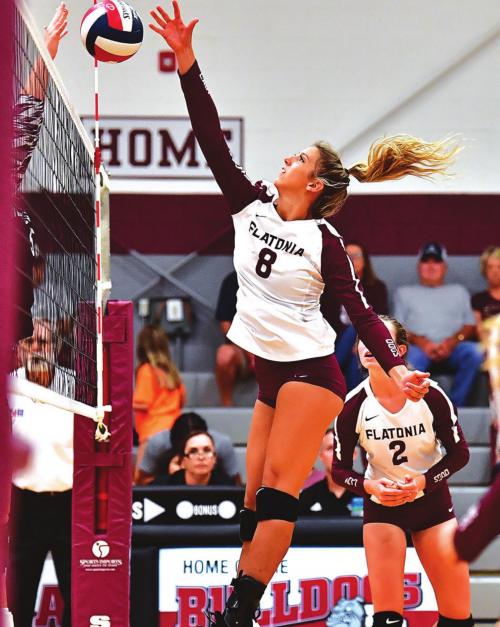 Braidy Fike goes up for a hit in Tuesday’s home volleyball game against Hallettsville. Photo by Stephanie Steinhauser