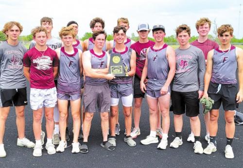 The members of the Fayetteville boys track team are shown above with their district team title trophy. They repeated the feat at area.