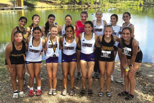 The La Grange girls cross country team ran at Camp Tejas last week.