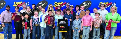 Pictured front from left: Emma Zweschper, Abigale McBride, Kaisley Janecka, Hudson Holub, Crockett Guenther, Rowdy Guenther, Jehnsen Janecka, Joe Carrales, and Coach Kaci Carrales; back row: Coach JoJo Carrales, Adalyn Carrales, Hailey Janish, Rheagan Karisch, Tori Newton, Laramie Laake, Sawyer Mau, Tatum Fritsch, Hudson Holub, Dylan Zwescpher, Logan Poncik, Abraham McBride, Brealey Nieto, and Rilan Karisch.