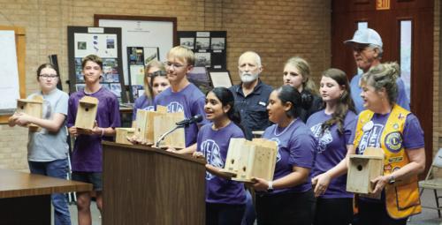 The La Grange High School Leo Club presented a set of birdhouses to the La Grange City Council Monday night, April 8. The birdhouses will be installed in the new Hope Hill Park. Photo by Andy Behlen