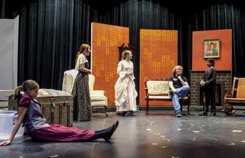Fayette County Community Theatre student actors rehearse a scene from Little Women, which will be performed at the LGISD Performing Arts Center July 24-26. Pictured (from left) are Eden Nichols as Jo, Molly Hudson as Marmee, Sarita Kinsey as Meg, Jeremiah Lenhart as Laurie and Lou McCain as Old Mr. Laurence. Photo by Andy Behlen