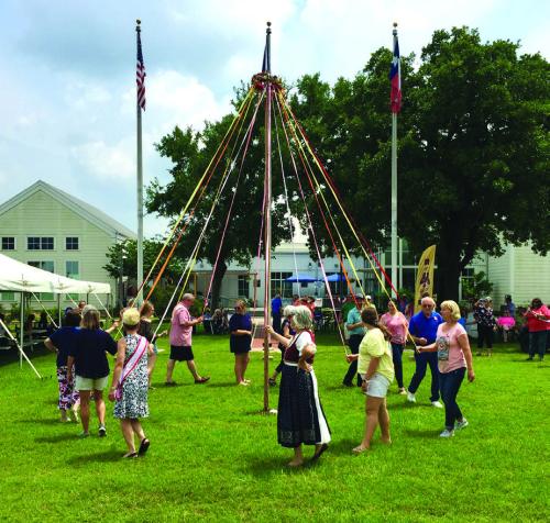 The day’s activities on May 18 include a traditional May Pole Dance at 2:30 p.m.