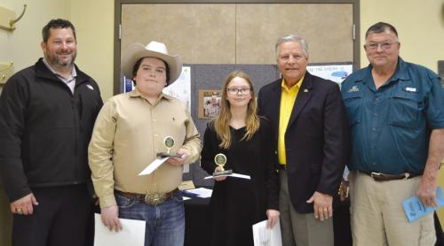 Essay Contest Winners (13 and Under Division): Rilan Karisch - Homeschool and Danica Steakley - Round Top-Carmine; presented by Chris Kaspar - Round Top State Bank, Gene Kruppa - Colorado Valley Communications, and Roy Wied - Carmine State Bank.