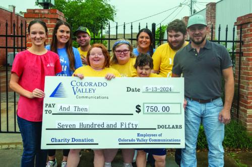 The employees of Colorado Valley Communications (CVC) donated $750 to And Then a New Day, a Schulenburg-based organization that helps young adults with learning challenges find meaningful work, social, and life opportunities. Pictured are (from left), back row, April Brossmann, Ty Janak, Presley Foster, Amy Machac, Logon Carrol, (front) CVC Customer Relations Assistant Faith Stork, Brooke Shimek, Amy Vaculik and CVC Central Office Tech Kyle Marek. Staff photo by Andy Behlen