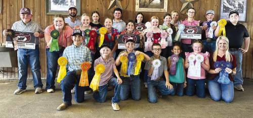 Pictured front from left: Dylan Zweschper, Joe Carrales, Hudson Holub, Tate Fritsch, Emma Zweschper, Abigale McBride, and Coach Kaci Carrales; middle row: Abraham McBride, Rheagan Karisch, Julia Melton, Kinsley Kutac, Adalyn Carrales, Kaisley Janecka, Laramie Laake; back row: Abraham McBride, Coach JoJo Carrales, Alexis Berckenhoff, Logan Poncik, Addison Berckenhoff , Peyton Gilchrest, Tatum Fritsch, Holden Holub, and Rilan Karisch.