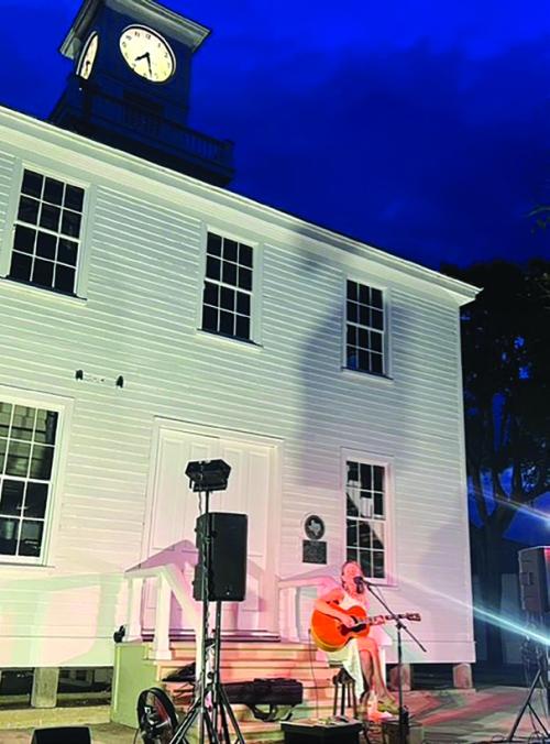 A photo for a previous year’s performance on the courthouse square in Fayetteville.