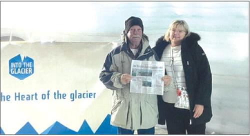 Gary and Betty Pior of Round Top inside the longest man made cave in the Langjokull Glacier near Reykjavik, Iceland. Enjoying the Fayette County Record.