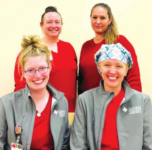 St. Mark’s Advanced Outpatient Wound Center team celebrating Go Red for Women day, front row from leftt: Jackie Faigle, FNP-C, and Stacie Schramek, RN; back row: Program Director Jennifer Scott, RN, and Katherine Logan, FDC.