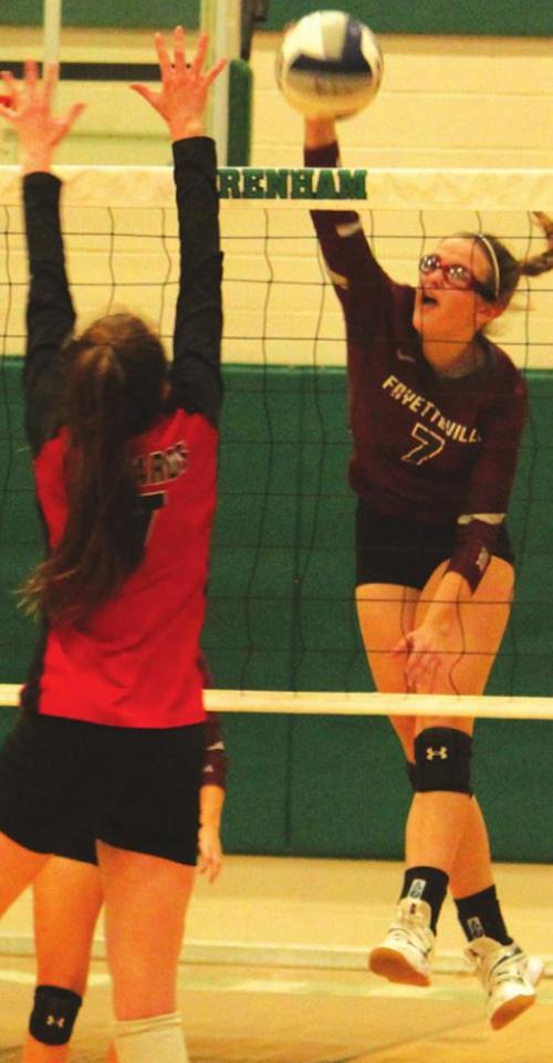 Fayetteville’s Brooklyn Jaeger spikes down one of her matchhigh 34 kills Monday against Richards.