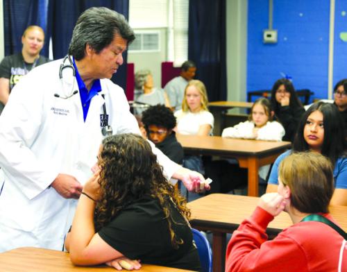 Dr. Jorge Duchicela, a family medicine practitioner with Youens &amp; Duchicela Clinic in Weimar, presents a program on health sciences at Career Quest held at the Blinn-Schulenburg Campus recently.