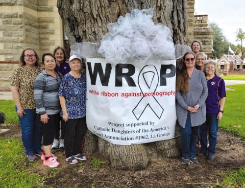Pictured left to right is: Elizabeth Kallus, Fide Orona, Shirley Antosh, Linda Winkler, Kathy Weishuhn, Theresa Mueller, Cynthia Novak; back: Marilyn Kothmann.