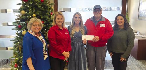 Prosperity Bank recently made a donation to the Texas Ramp Project. Pictured from left are Barbara Janacek, Marsha Hutton, Ashley Firkins, Frank Smith with the Texas Ramp Project, and Lily Rios. The Texas Ramp Project builds ramps at homes for local folks who have mobility issues. Photo by Jeff Wick