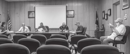 Flatonia City Council held a meeting before a mostly-empty Council chamber Tuesday night, Dec. 9. Pictured (from left) are Councilwoman Catherine Steinhauser, Councilwoman Ginny Sears, Councilman Dennis Geesaman, Councilman Allen Kocian, Mayor Bryan Milson and Councilman Mark Eversole. Photo by Andy Behlen